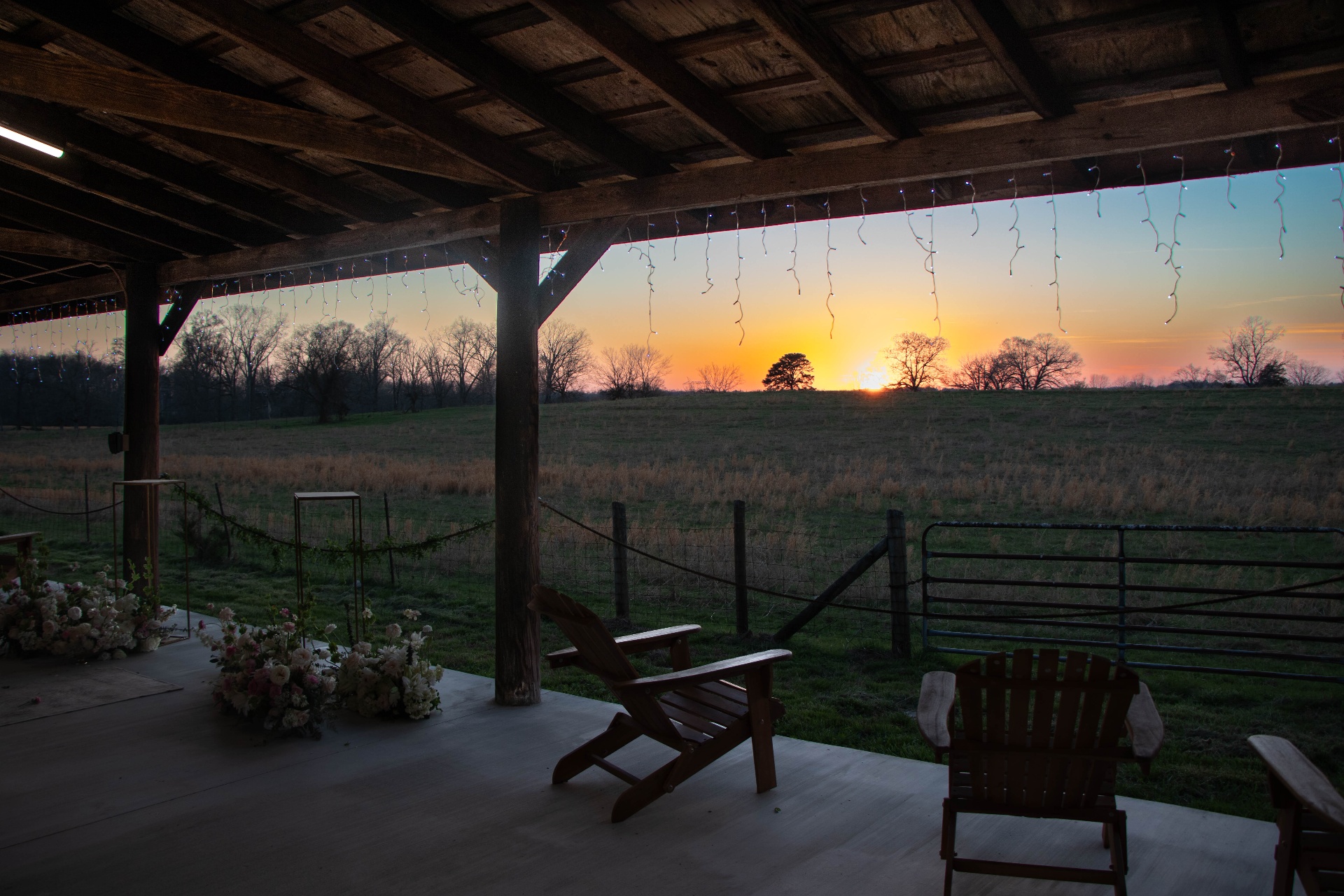 Sunset view from the pavilion porch across the fields at L & D Farms