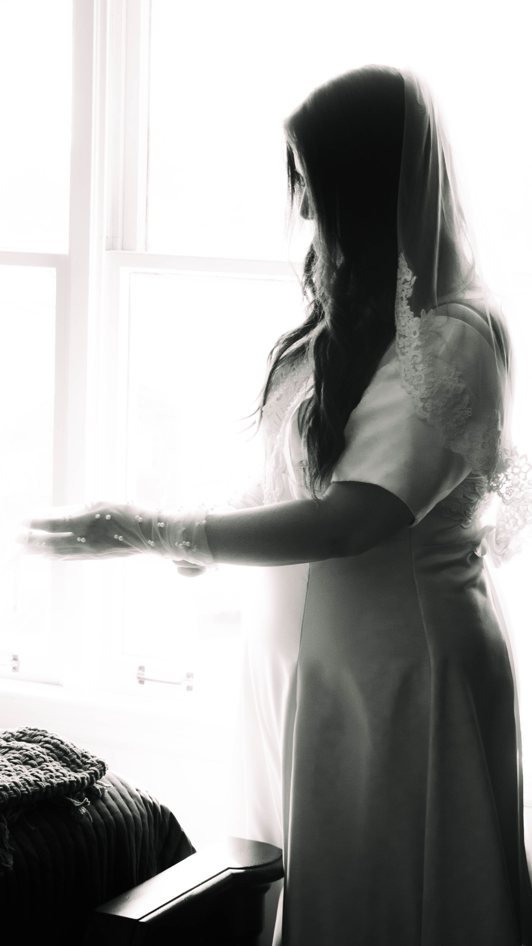Black and white bridal silhouette by the window at L & D Farms