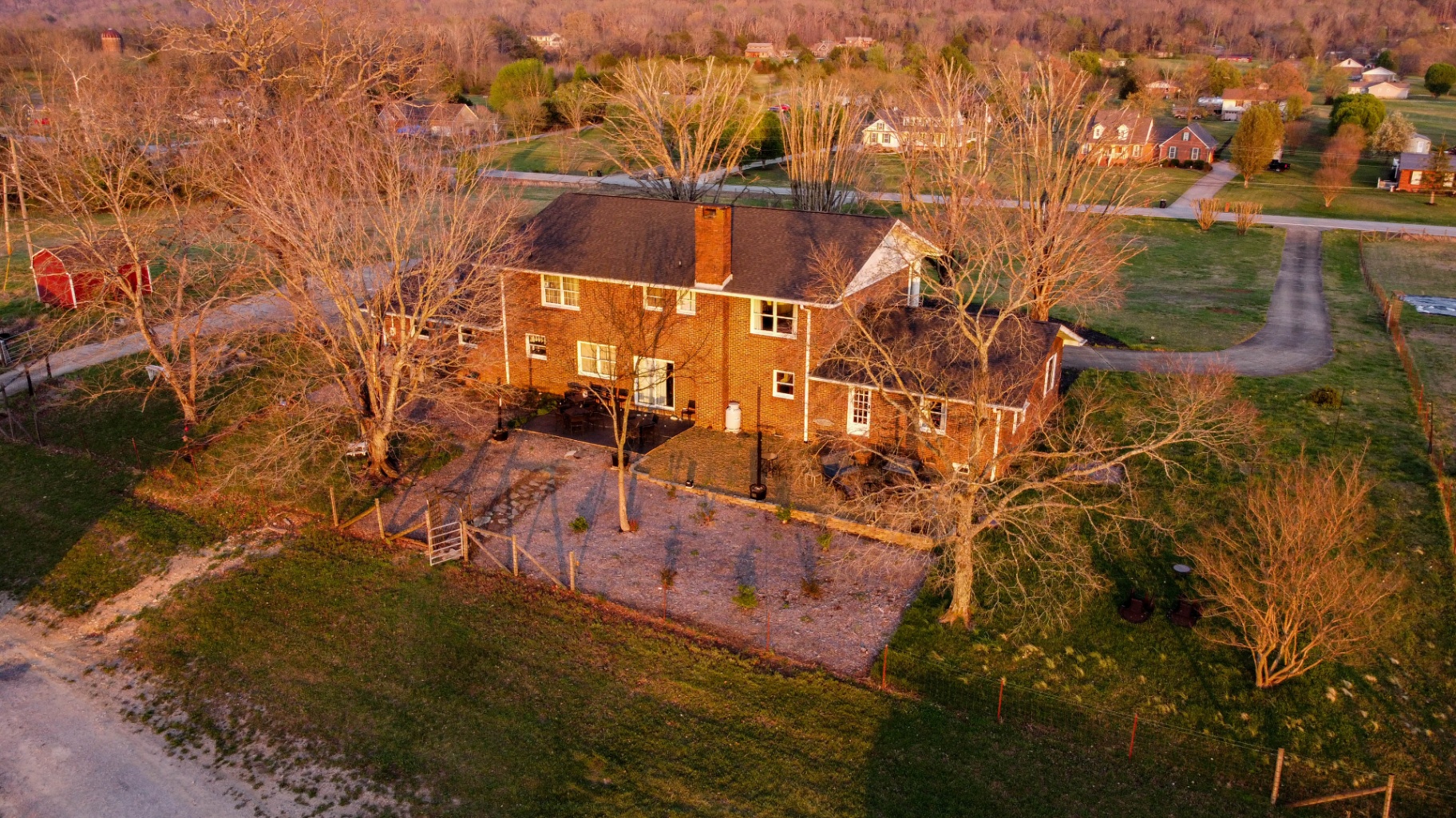 Aerial view of the farmhouse and grounds at L & D Farms