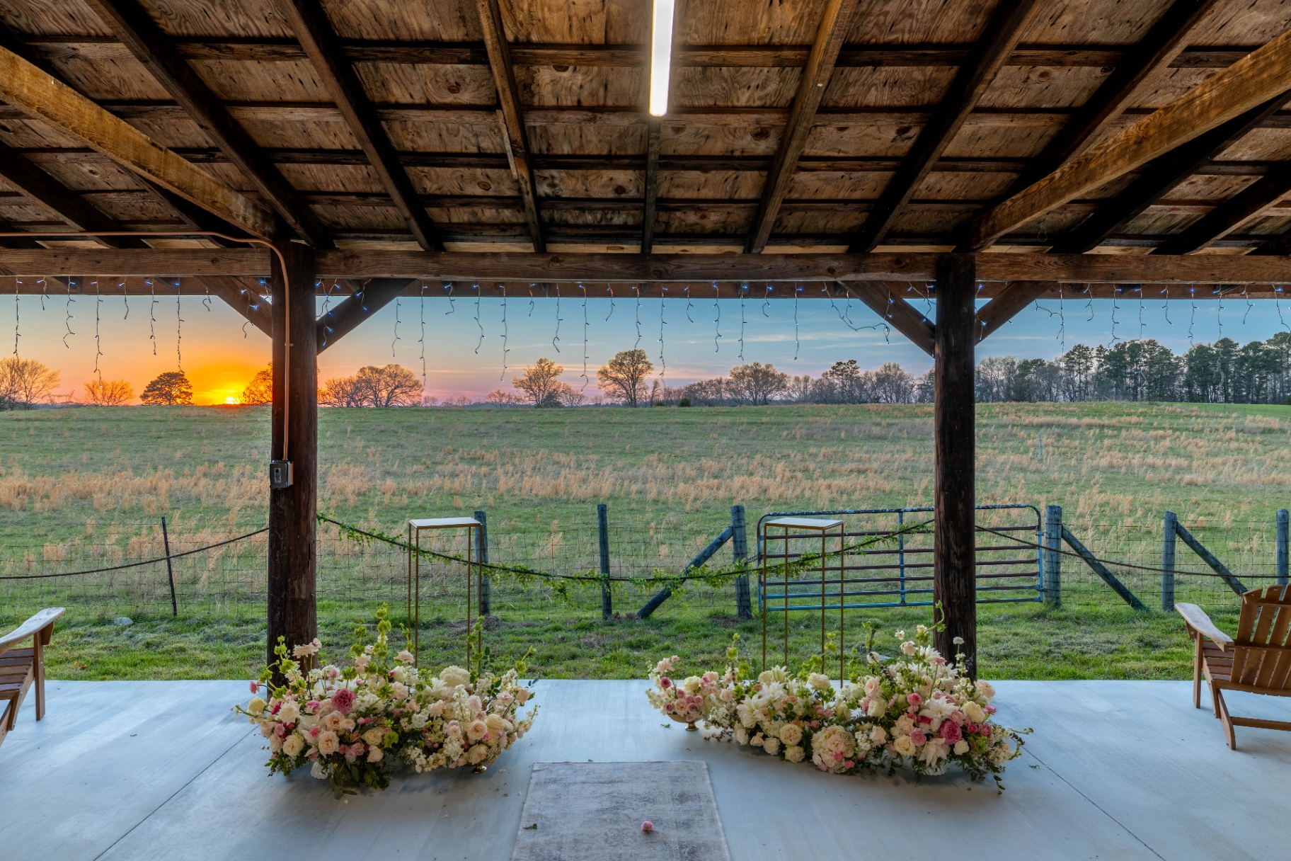 Pavilion ceremony space overlooking the sunset at L & D Farms